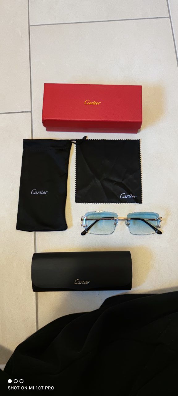 Cartier Cartier Sonnenbrille mit hellblauen Gläsern
