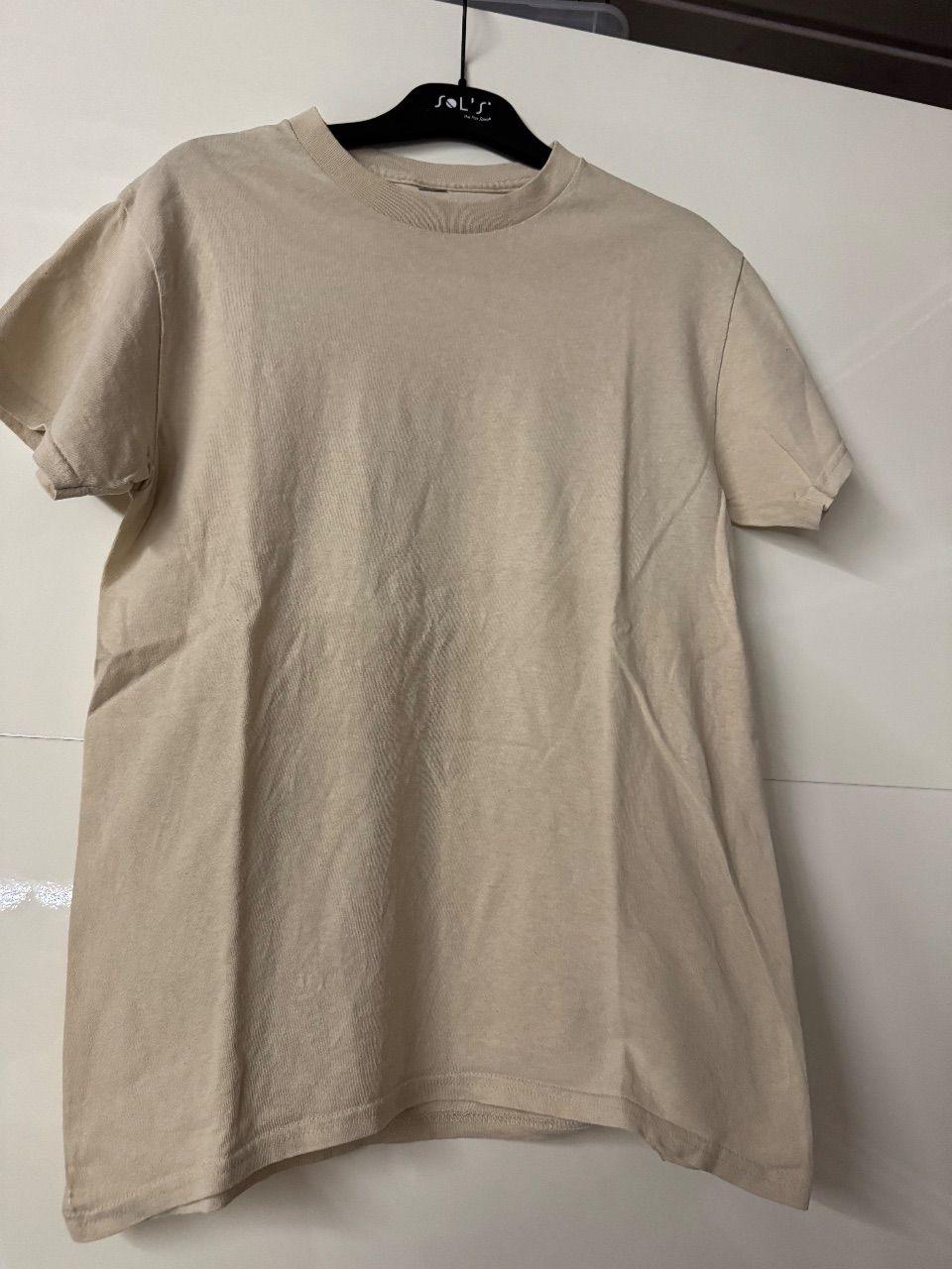 Ohne Marke Damenoberteil mit Aufdruck am Rücken zu verkaufen  Size S
