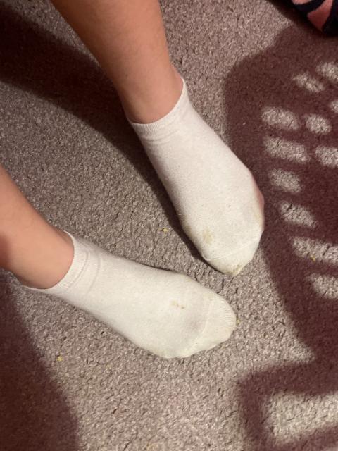 Weise getragene Socken