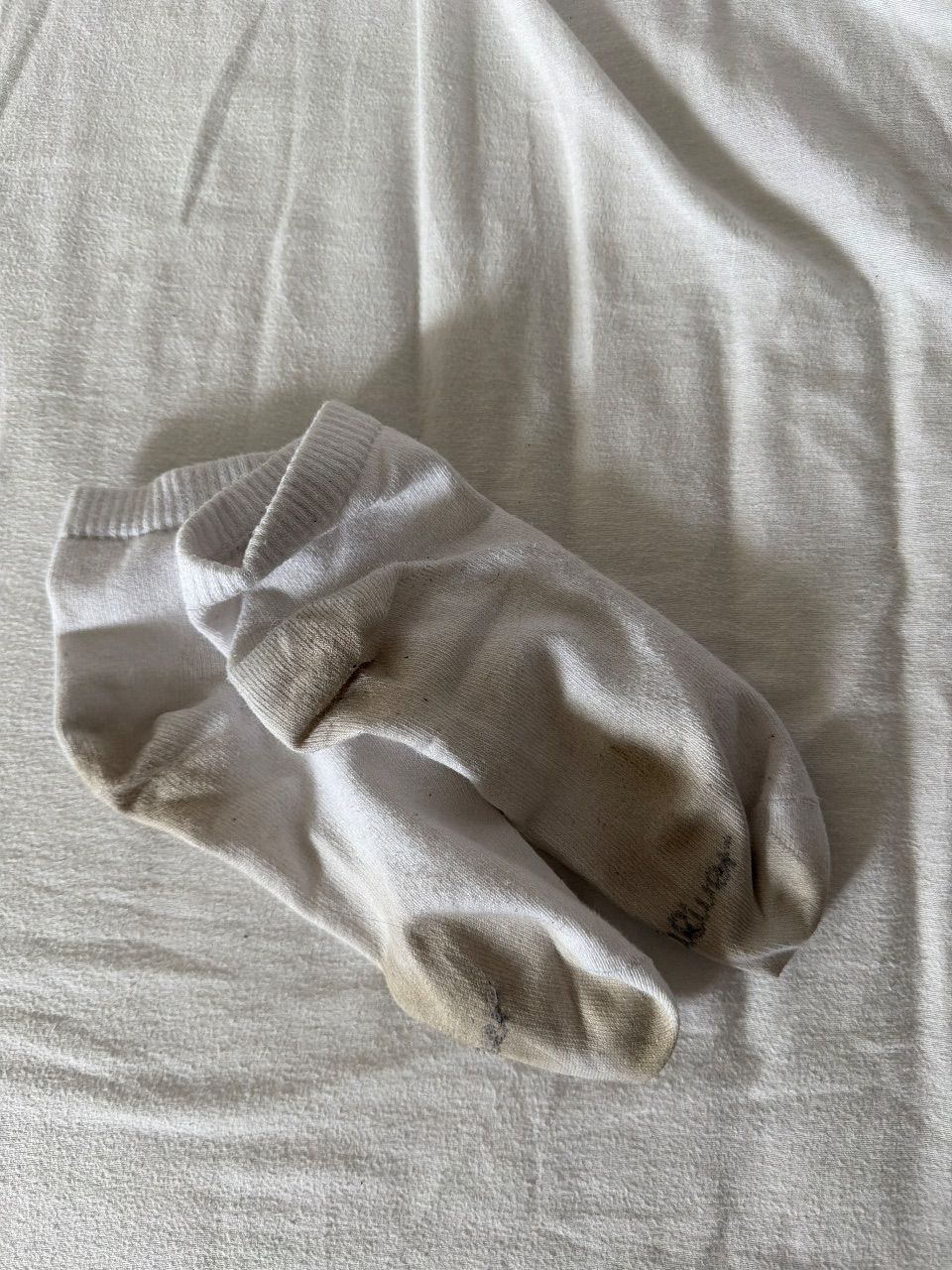 Getragene Socken weiß