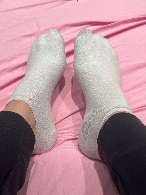 Weiße getragene Socken