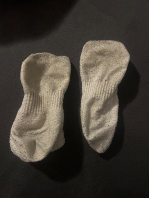 weise getragene socken
