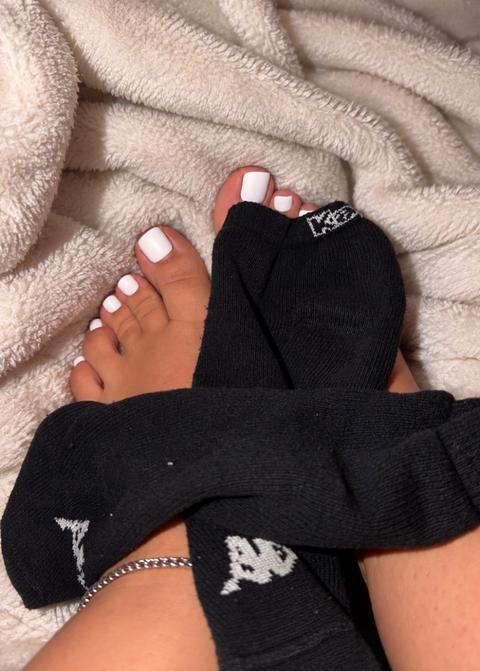 Getragene schwarze Kappa Damen Socken